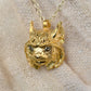 Gold lynx head pendant with diamond eyes and a gold chain. *This piece is finished and ready to be shipped* © Adrian Ashley