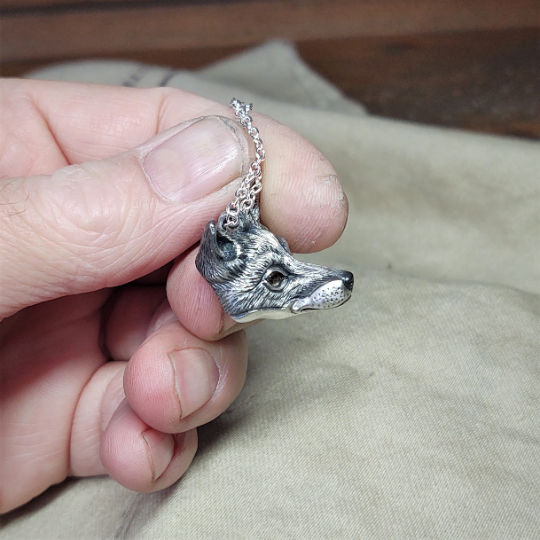 Small silver fox Necklace. Fox's head pendant in sterling silver with citrine eyes and a silver chain. © Adrian Ashley