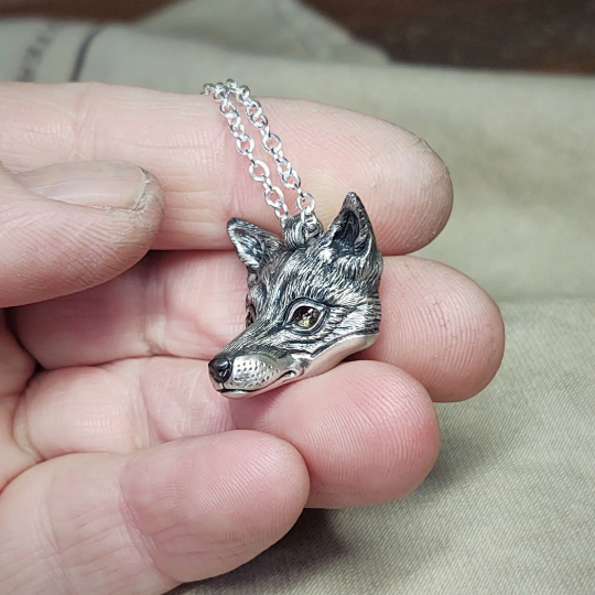 Small silver fox Necklace. Fox's head pendant in sterling silver with citrine eyes and a silver chain. © Adrian Ashley