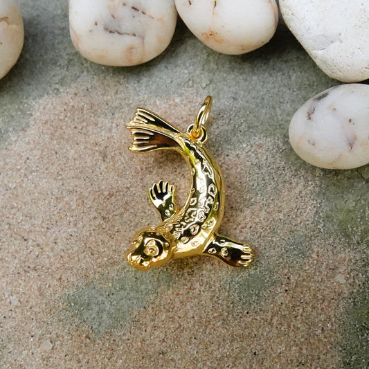 Seal necklace. Gold seal charm pendant. Animal totem jewellery. Handmade to order. © Adrian Ashley