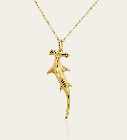 Gold plated silver Hammerhead pendant & cord or chain. © Adrian Ashley