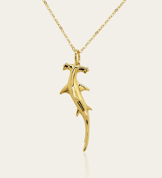 Gold plated silver Hammerhead Shark pendant and chain. © Adrian Ashley