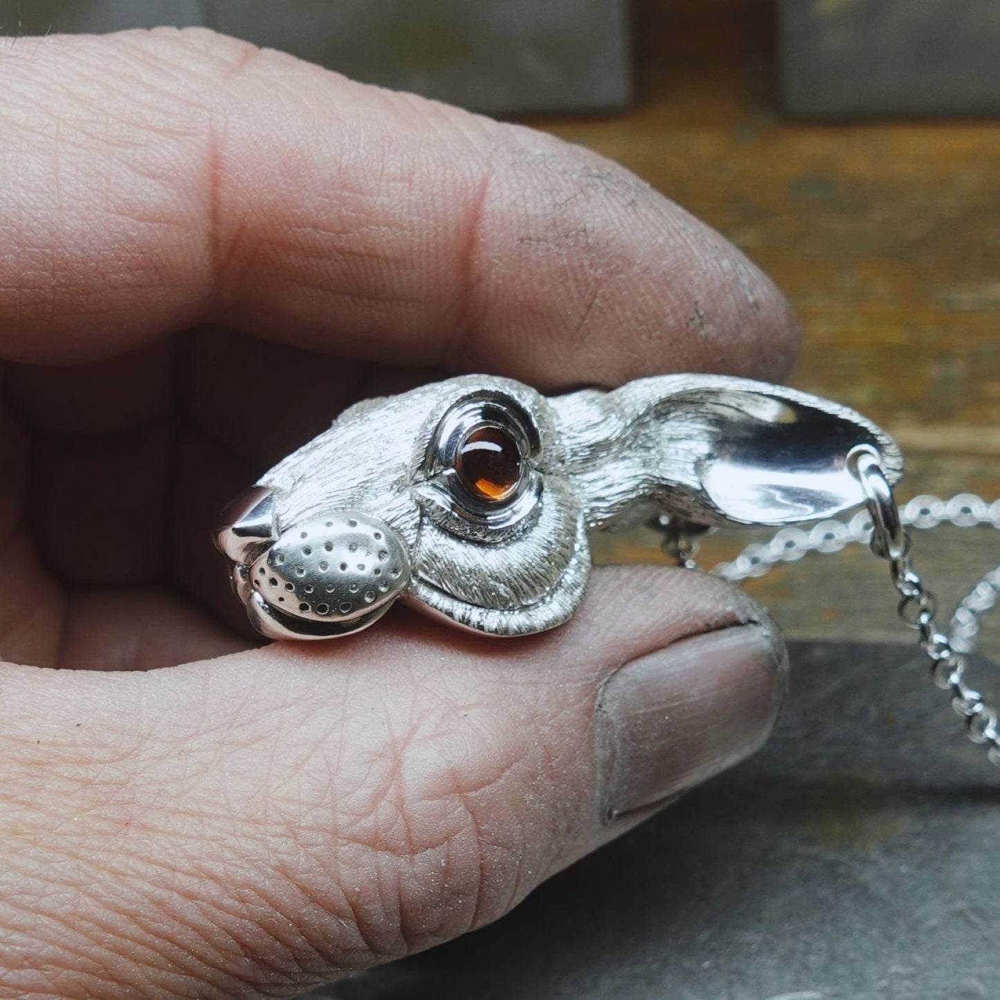 Silver hare necklace. Rabbit pendant with natural gemstone eyes. Hand made to order. © Adrian Ashley