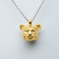 Solid 22ct gold lioness pendant and platinum chain. Handmade to order. © Adrian Ashley