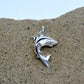 Baby shark charm 3D necklace made from highly polished, tarnish resistant silver, hung on a solid silver chain. © Adrian Ashley