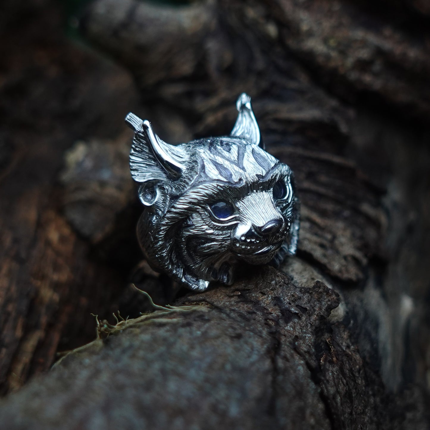 Silver lynx ring. Platinum plated sterling silver Lynx's head ring with natural gemstone eyes. *This piece is finished and ready to be shipped* © Adrian Ashley