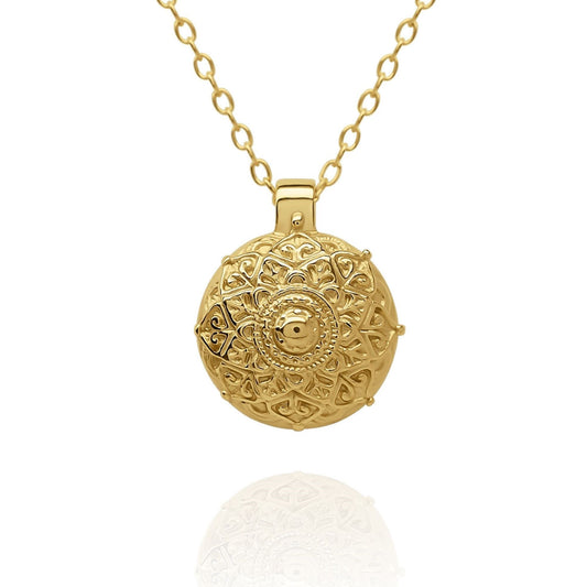 Gold vermeil Mandala charm pendant and chain. © Adrian Ashley