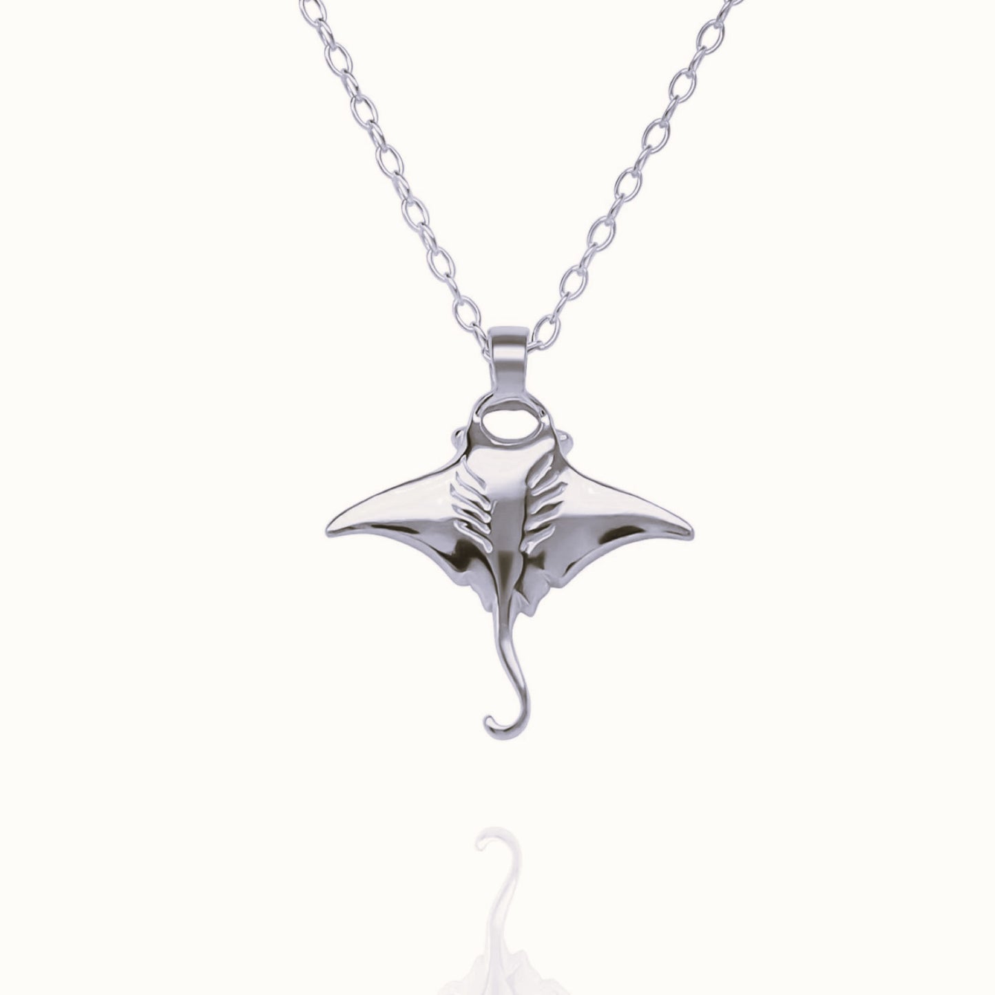 Platinum Manta Ray charm with a solid platinum chain. Made to order. © Adrian Ashley