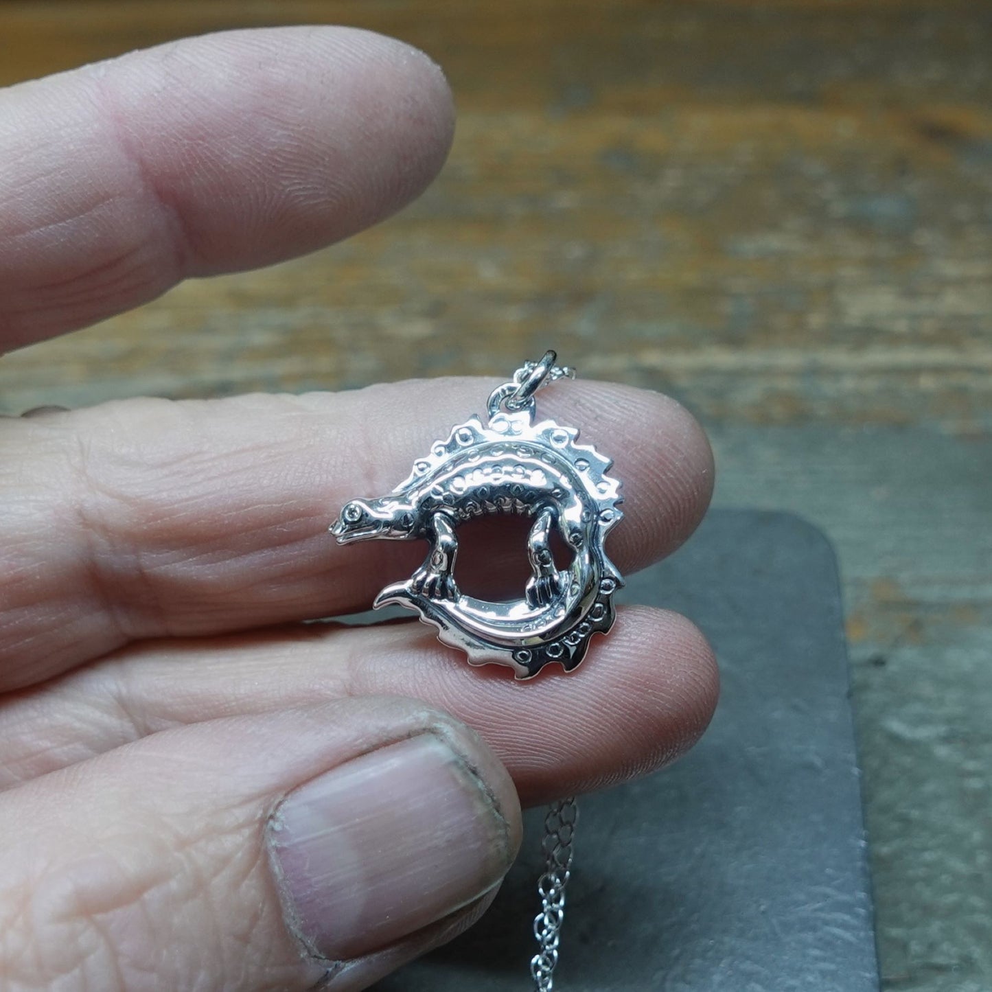 The Great Crested Newt (Triturus cristatus)  pendant with a silver chain, sterling silver newt necklace, wildlife jewellery. © Adrian Ashley