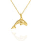Gold vermeil Orca charm pendant and chain. © Adrian Ashley