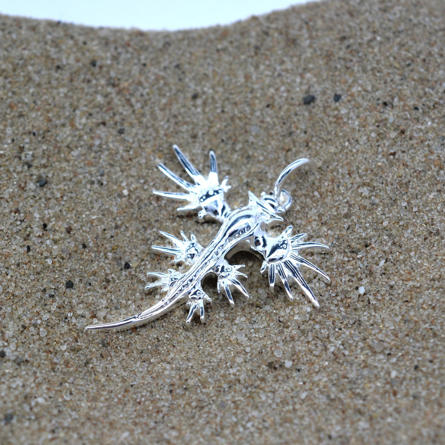 Sea Swallow, Glaucus atlanticus, nudibranch necklace. Highly polished, tarnish resistant silver, strung on a strong cord. © Adrian Ashley