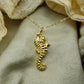 Gold plated silver Seahorse pendant and chain. © Adrian Ashley