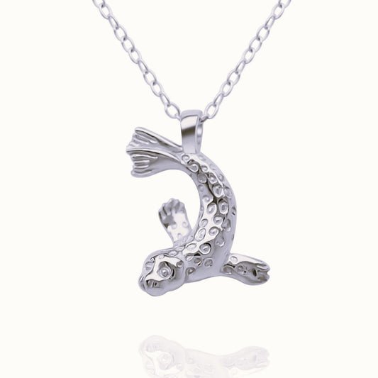 Platinum Seal charm with a solid platinum chain. Made to order. © Adrian Ashley