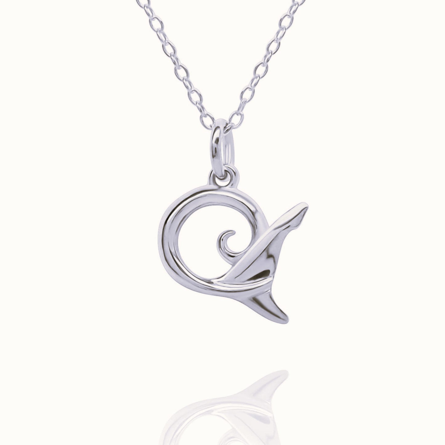 Platinum Shark Tail charm with a solid platinum chain. Made to order. © Adrian Ashley