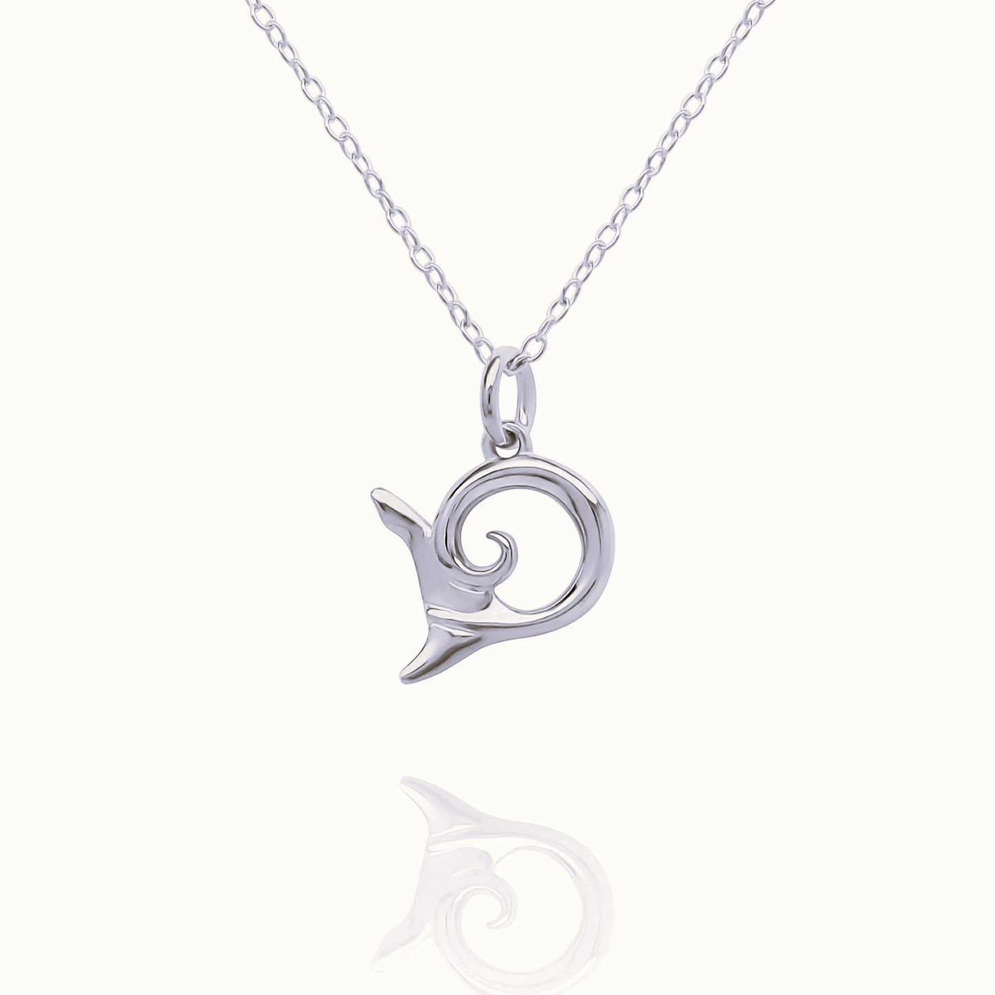 Platinum Shark Tail charm with a solid platinum chain. Made to order. © Adrian Ashley