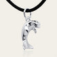 Dugong necklace, Made from highly polished, tarnish resistant silver, strung on a strong cord. © Adrian Ashley