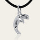 Dugong necklace, Made from highly polished, tarnish resistant silver, strung on a strong cord. © Adrian Ashley