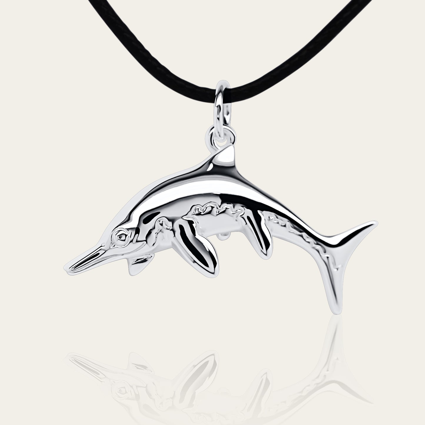 Ichthyosaurus necklace, Made from highly polished, tarnish resistant silver, strung on a strong cord. © Adrian Ashley