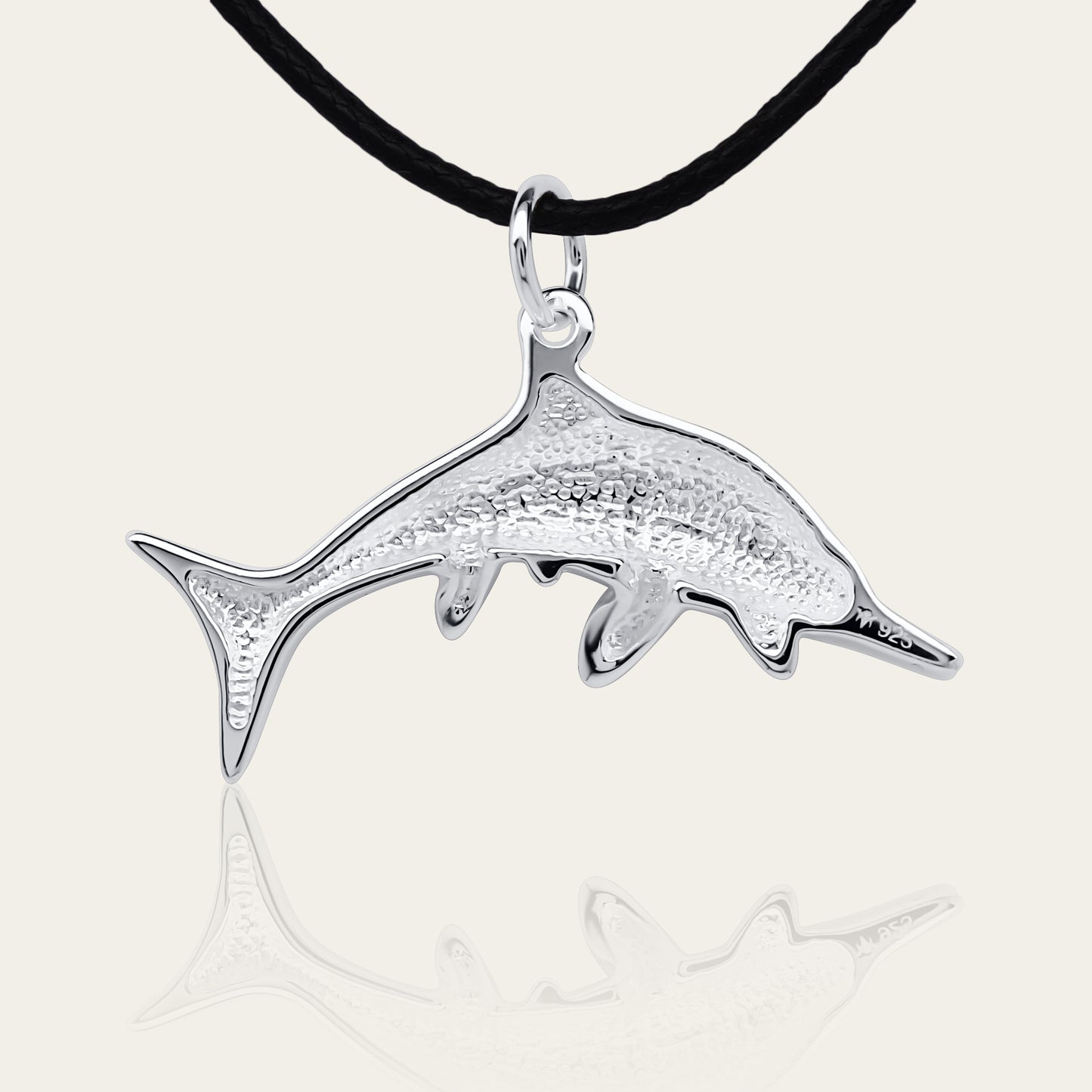 Ichthyosaurus necklace, Made from highly polished, tarnish resistant silver, strung on a strong cord. © Adrian Ashley