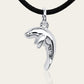 Manatee charm necklace. Made from highly polished, tarnish resistant silver, strung on a strong cord. © Adrian Ashley