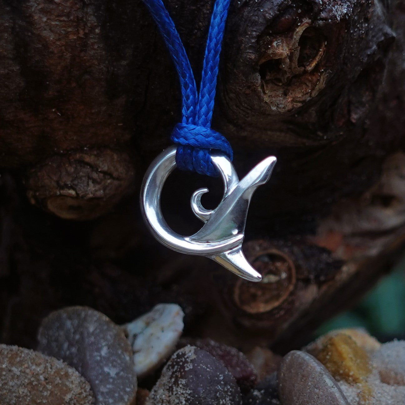Shark's tail necklace. Solid white gold shark tail design. This piece will be handmade for you. © Adrian Ashley