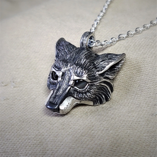 Small silver wolf Necklace. Wolf's head pendant in sterling silver with grey moonstone eyes and a solid chain. Hand made to order. © Adrian Ashley
