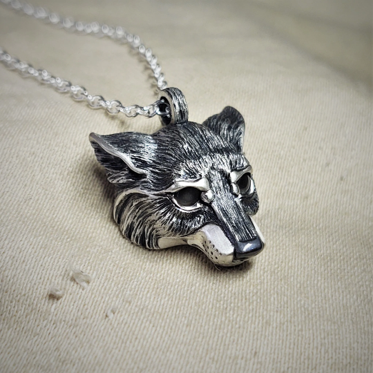 Small silver wolf Necklace. Wolf's head pendant in sterling silver with grey moonstone eyes and a solid chain. Hand made to order. © Adrian Ashley