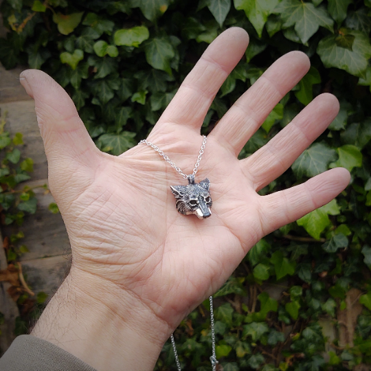 Small silver wolf Necklace. Wolf's head pendant in sterling silver with grey moonstone eyes and a solid chain. Hand made to order. © Adrian Ashley