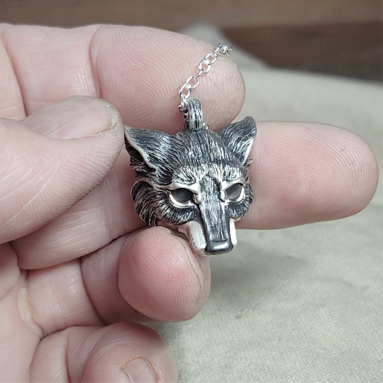 Small silver wolf Necklace. Wolf's head pendant in sterling silver with grey moonstone eyes and a solid chain. Hand made to order. © Adrian Ashley