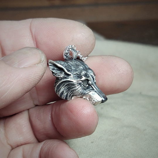 Small silver wolf Necklace. Wolf's head pendant in sterling silver with grey moonstone eyes and a solid chain. Hand made to order. © Adrian Ashley