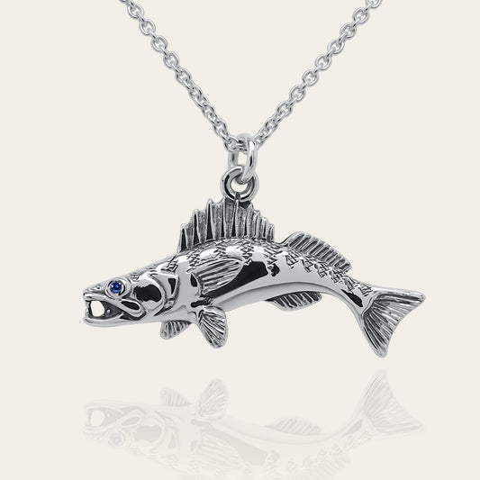 Zander fishing necklace. Made from sterling silver with an antiqued finish, set with a gemstone eye. Walleye pendant, ideal fisherman’s angling gift © Adrian Ashley