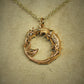 Gold dragon necklace. Diamond eyed ouroboros dragon talisman. Hand made to order. © Adrian Ashley