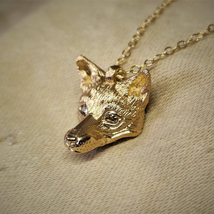 Gold fox Necklace. Fox head pendant with natural diamond eyes and a so adrian ashley