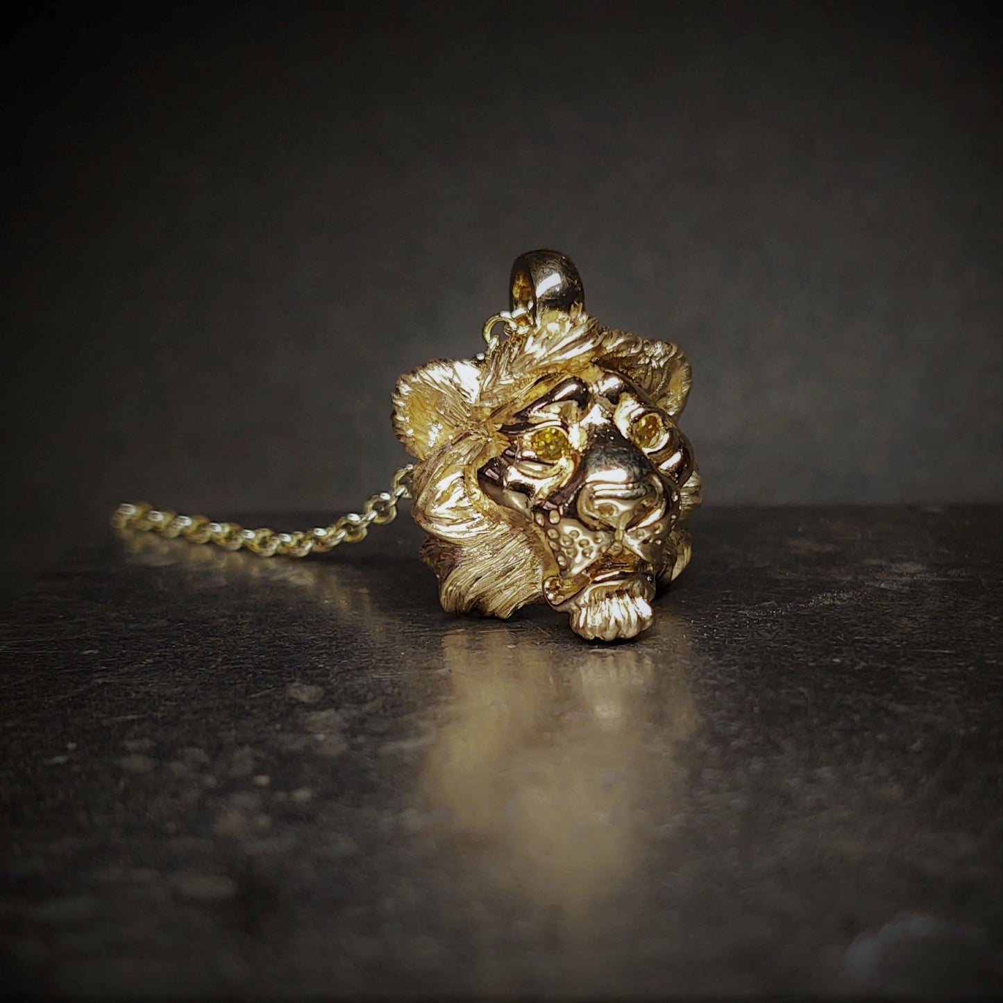 Gold Lion necklace, Lion's head pendant and solid gold chain. Yellow diamond eyes. This piece will be hand made for you in the UK. © Adrian Ashley