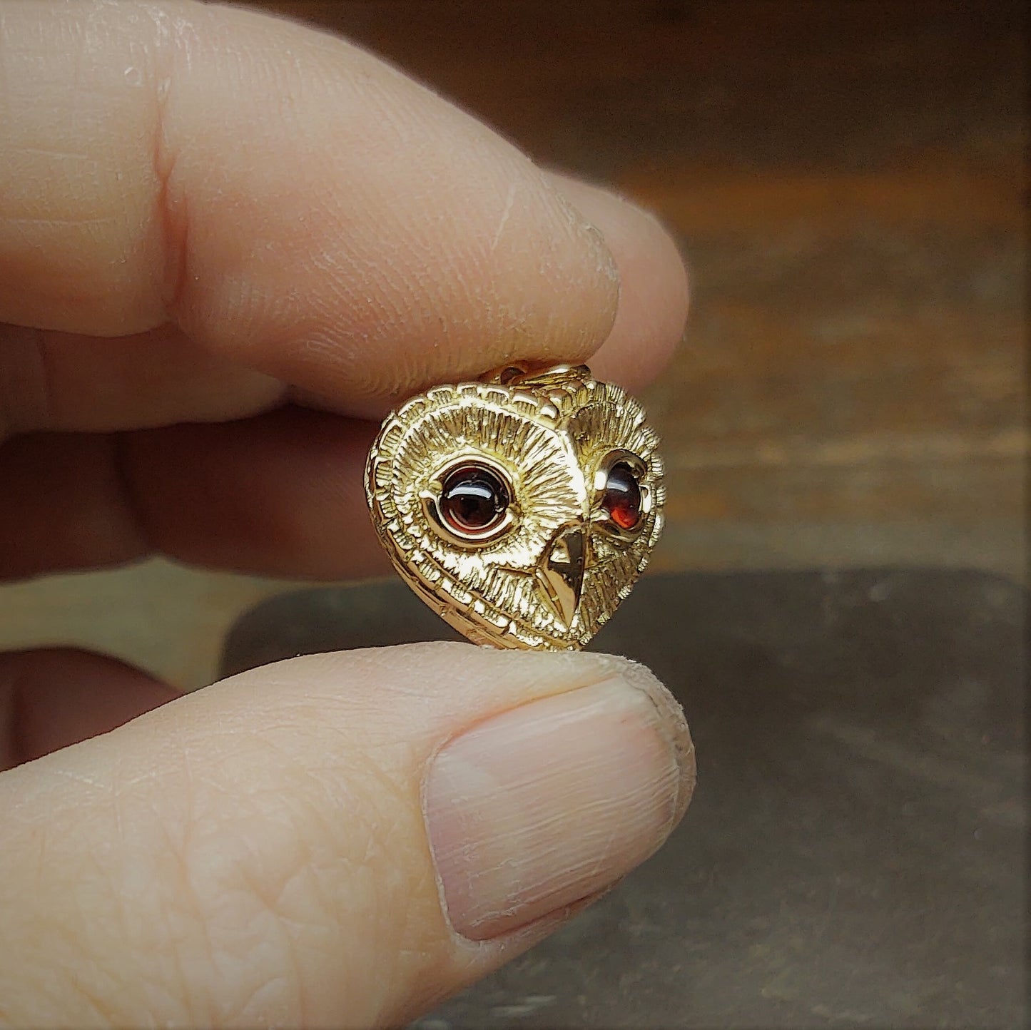 Gold owl necklace Solid gold and garnet, heart shaped owl pendant. Hand made to order. © Adrian Ashley