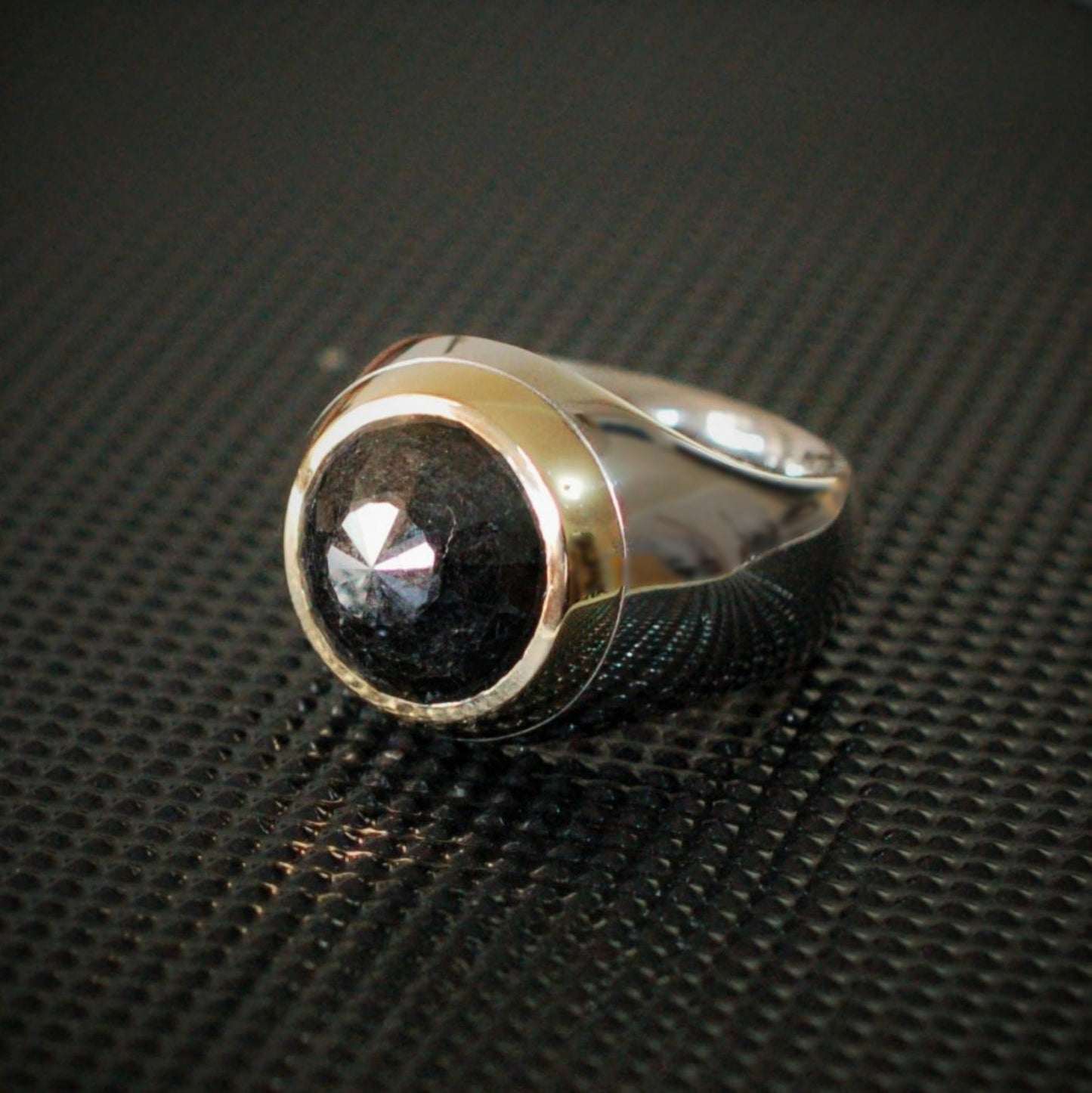 Diamond ring set with a very large 12.35ct rose-cut black diamond. Would fit a UK finger size S to T, US size 9.5 © Adrian Ashley