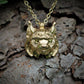 Gold lynx head pendant with diamond eyes and a gold chain. Hand made to order. © Adrian Ashley