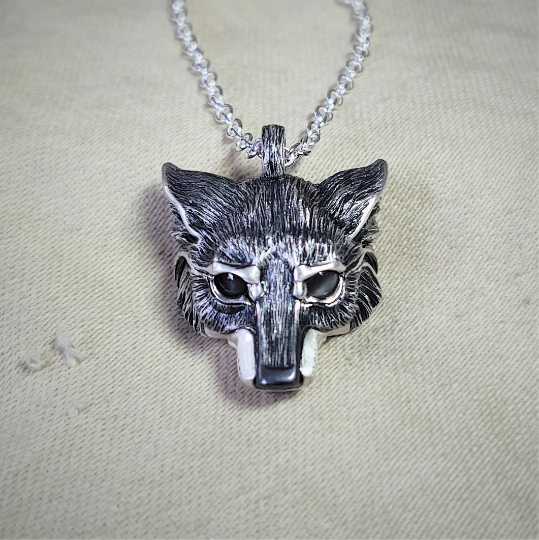 Small silver wolf Necklace. Wolf's head pendant in sterling silver with grey moonstone eyes and a solid chain. *This piece is finished and ready to be shipped* © Adrian Ashley